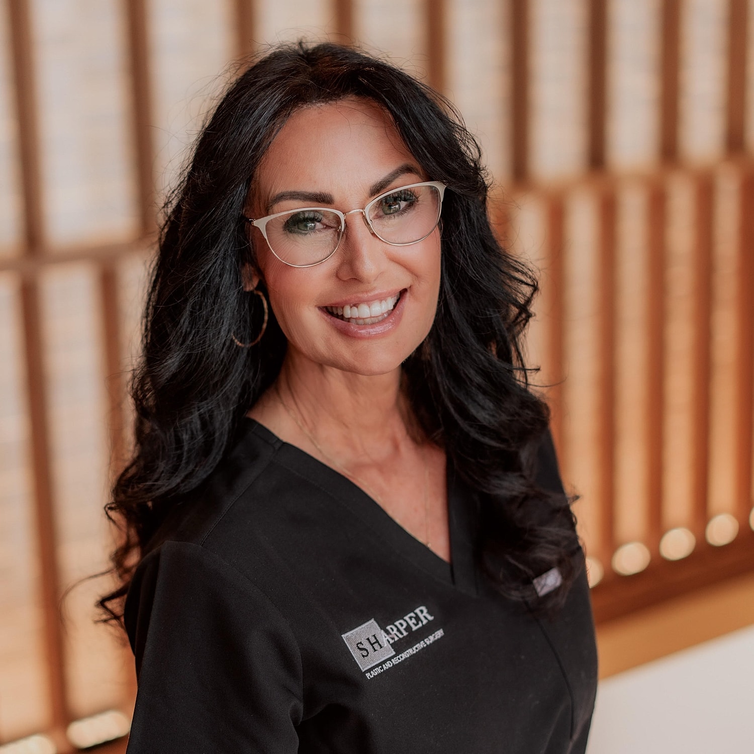 Silhouette of a woman with long hair.