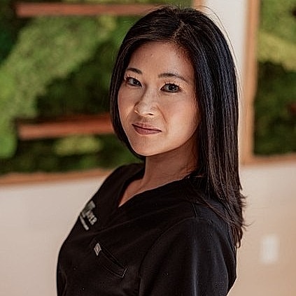Silhouette of a woman with long hair.