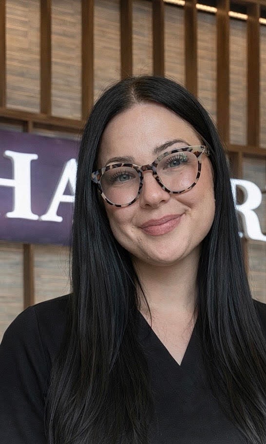 Silhouette of a woman with long hair.