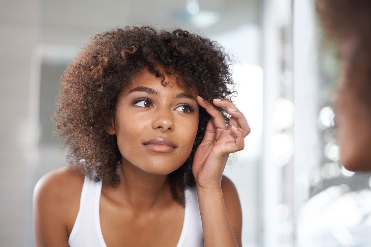 indianapolis blepharoplasty model with curly hair