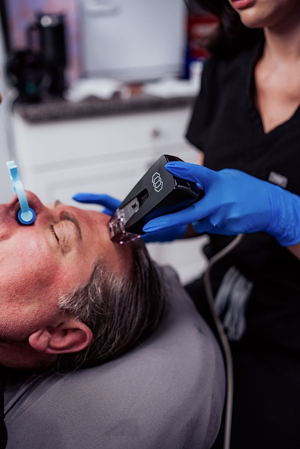 Skincare treatment in a clinical setting.