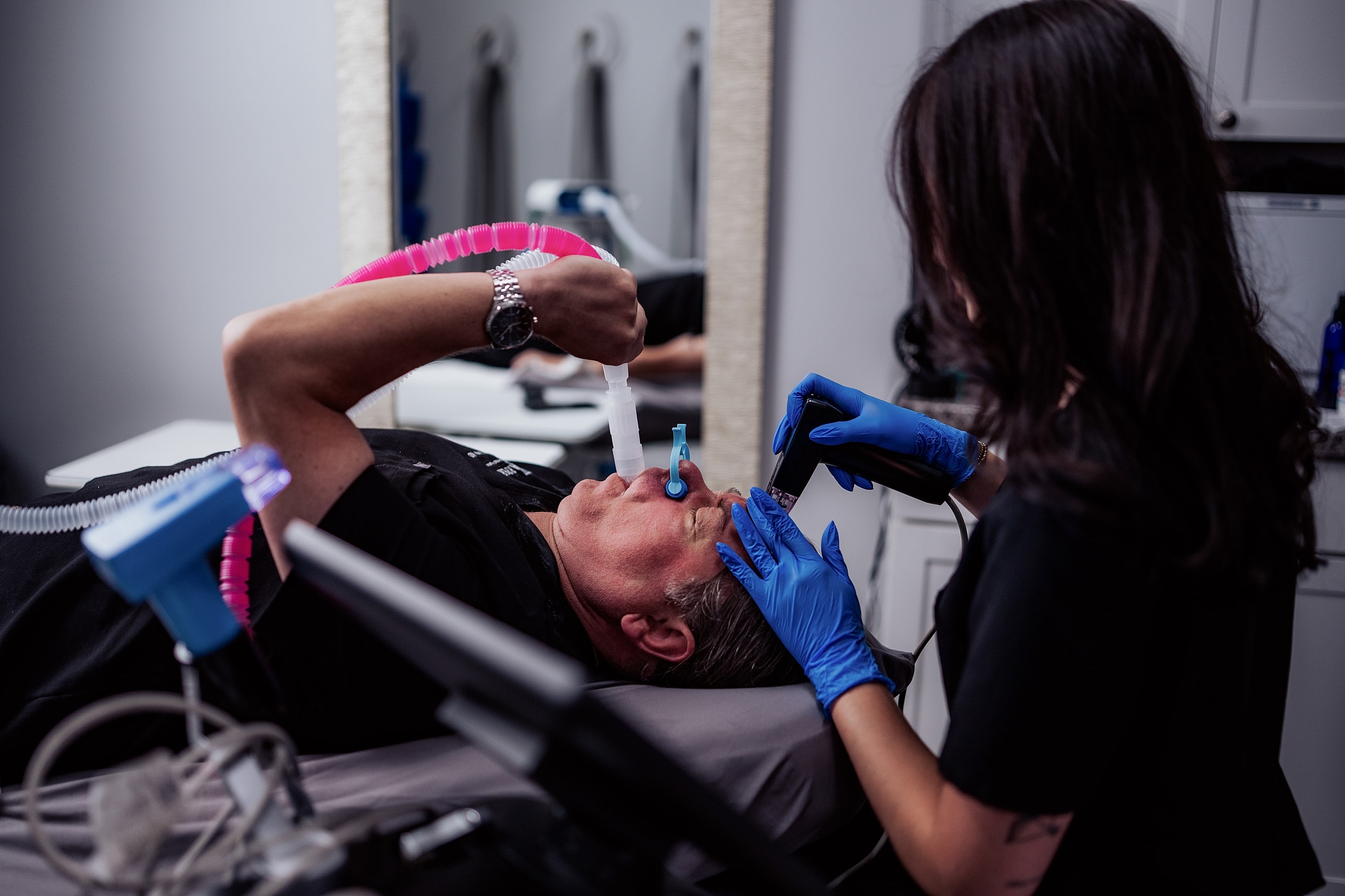 Facial treatment session in a skincare clinic.